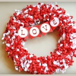 silhouette love bunting added to baked and curled grosgrain ribbon wreath